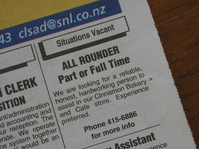 A local newspaper showing job vacancies for a bakery, an administration job and a personal assistant.
