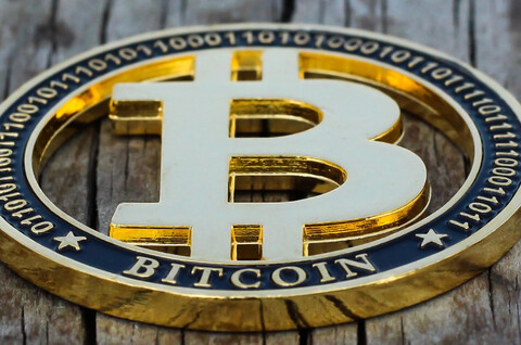 A large house with a green roof.